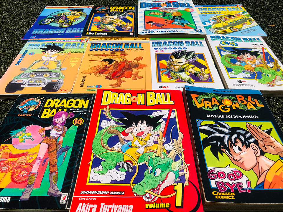 Lined-up Dragon Ball manga covers in different languages. Languages include English, German, Chinese, etc.