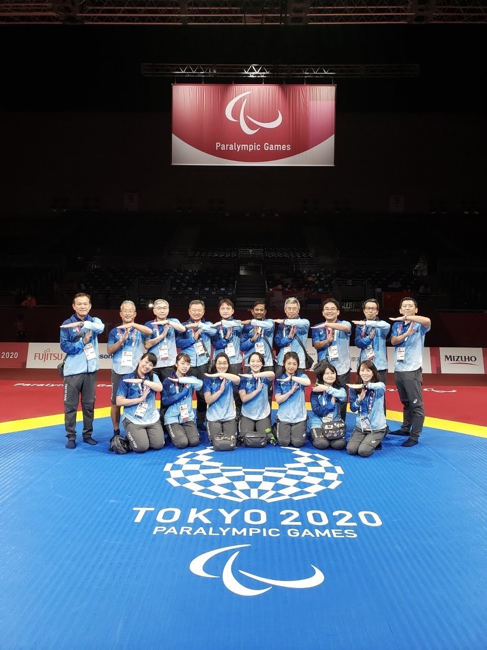 Taekwondo volunteers for the Tokyo 2020 Paralympic Games. Tarumi is on the far left.