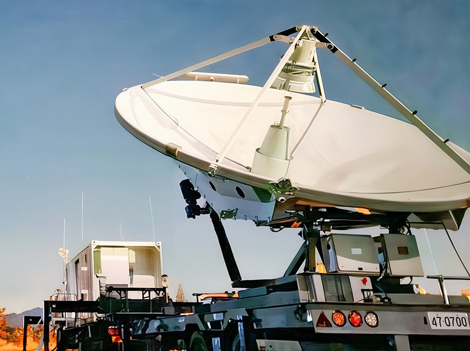 A large equipment with satellite dishes on the ground, owned by the Japan Air Self-Defense Force.