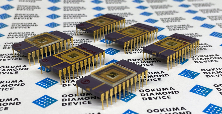 Six synthetic-diamond semiconductors developed by Ookuma Diamond Dvices on a white background.